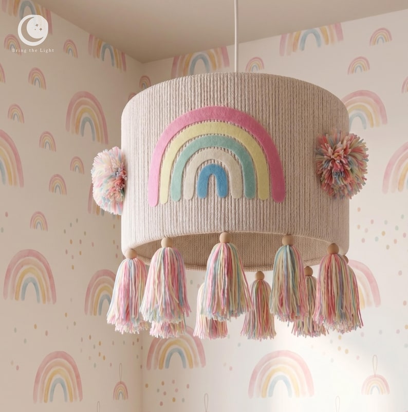 Pastel rainbow ceiling shade with colourful pompoms and a long tassel fringe