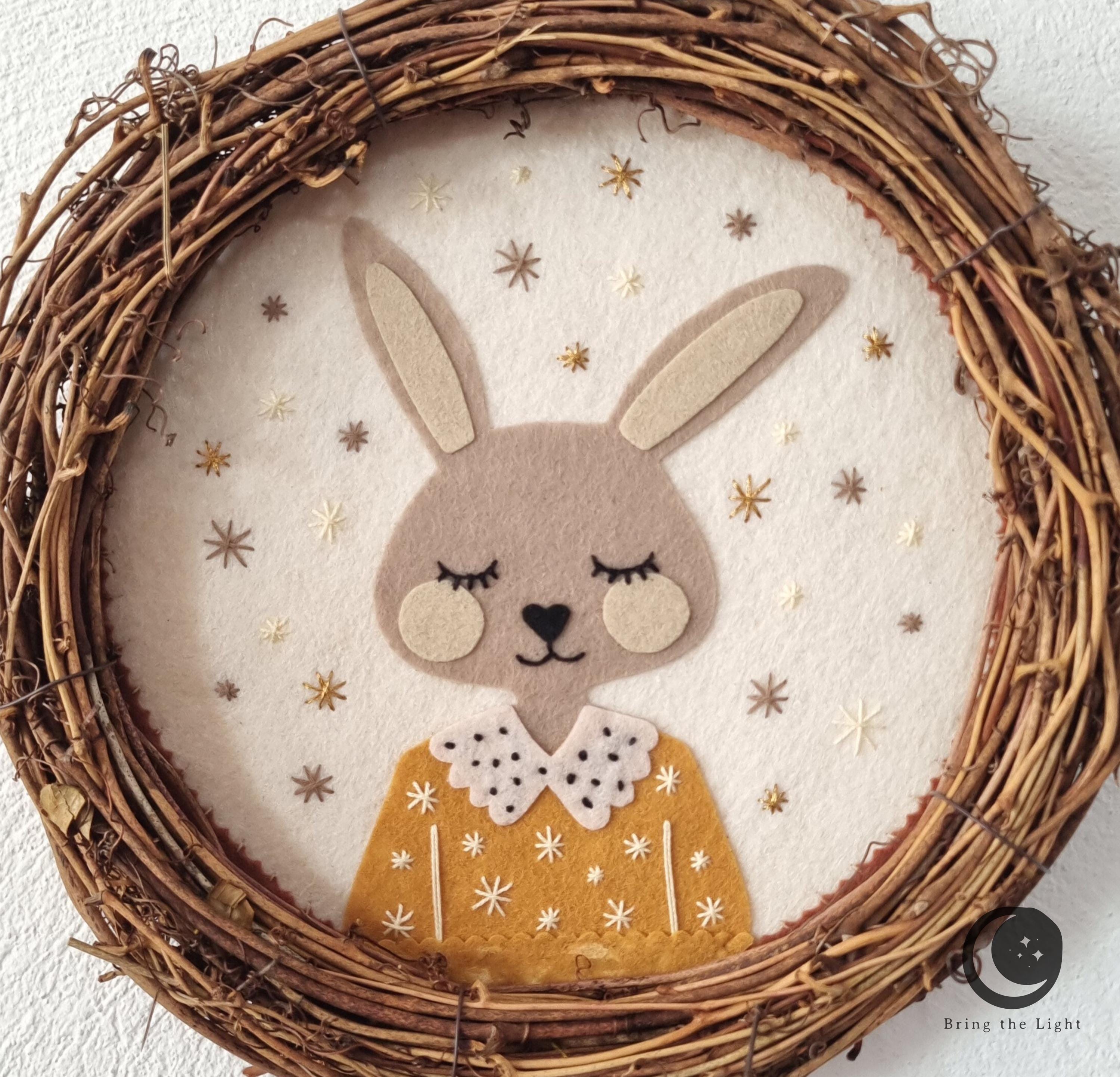 Handmade felt bunny wall wreath for a nursery