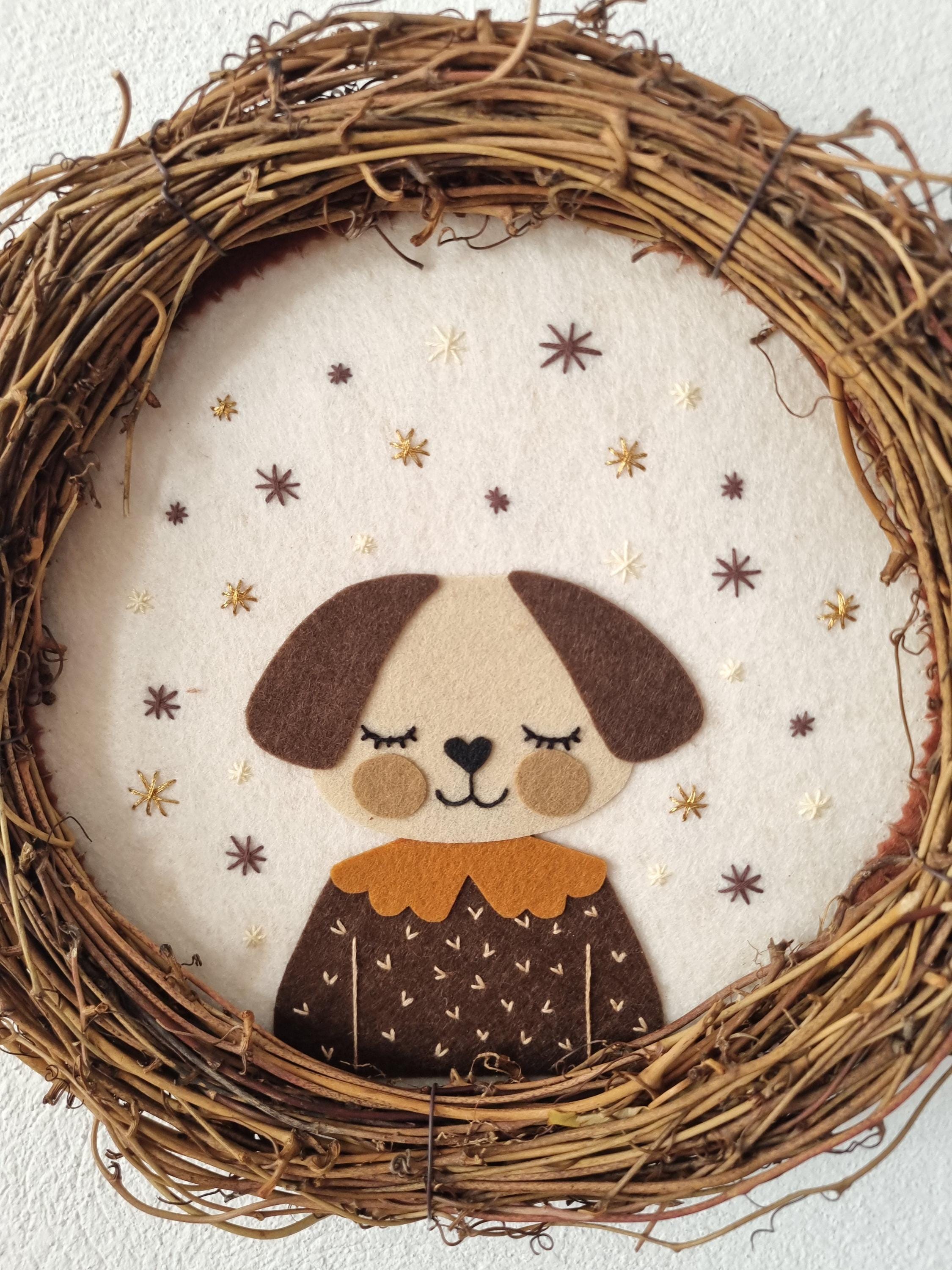 Handmade felt dog wall wreath for a nursery
