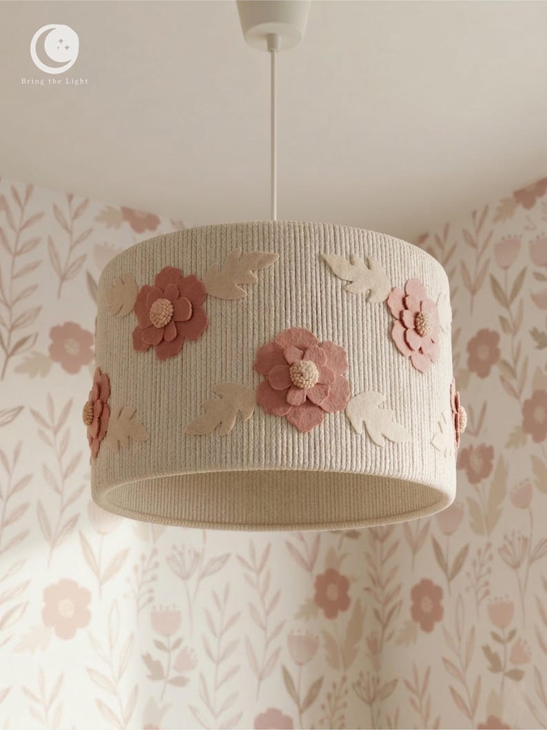 Handmade floral nursery lampshade with felt flowers in blush and dusty rose on a ribbed cotton base