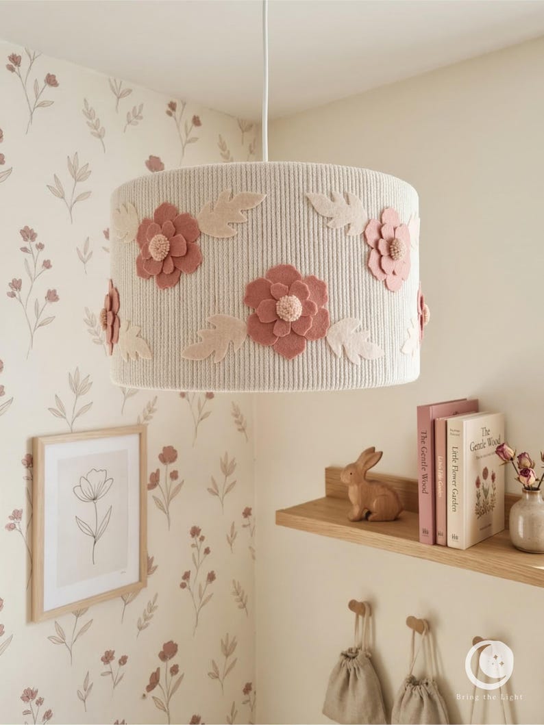 Handmade floral nursery lampshade with felt flowers in blush and dusty rose on a ribbed cotton base