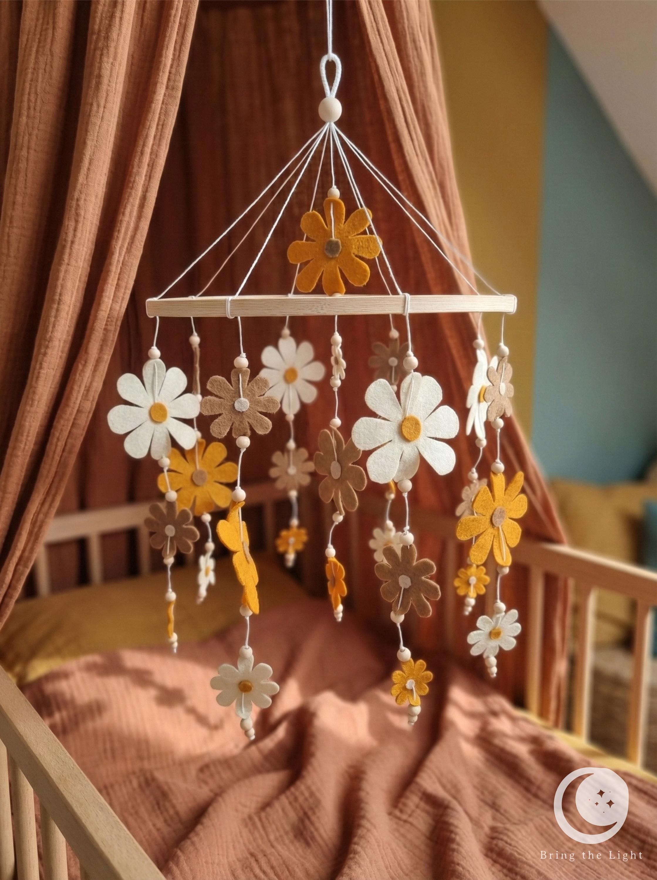 Felt flower baby mobile in neutral nursery tones