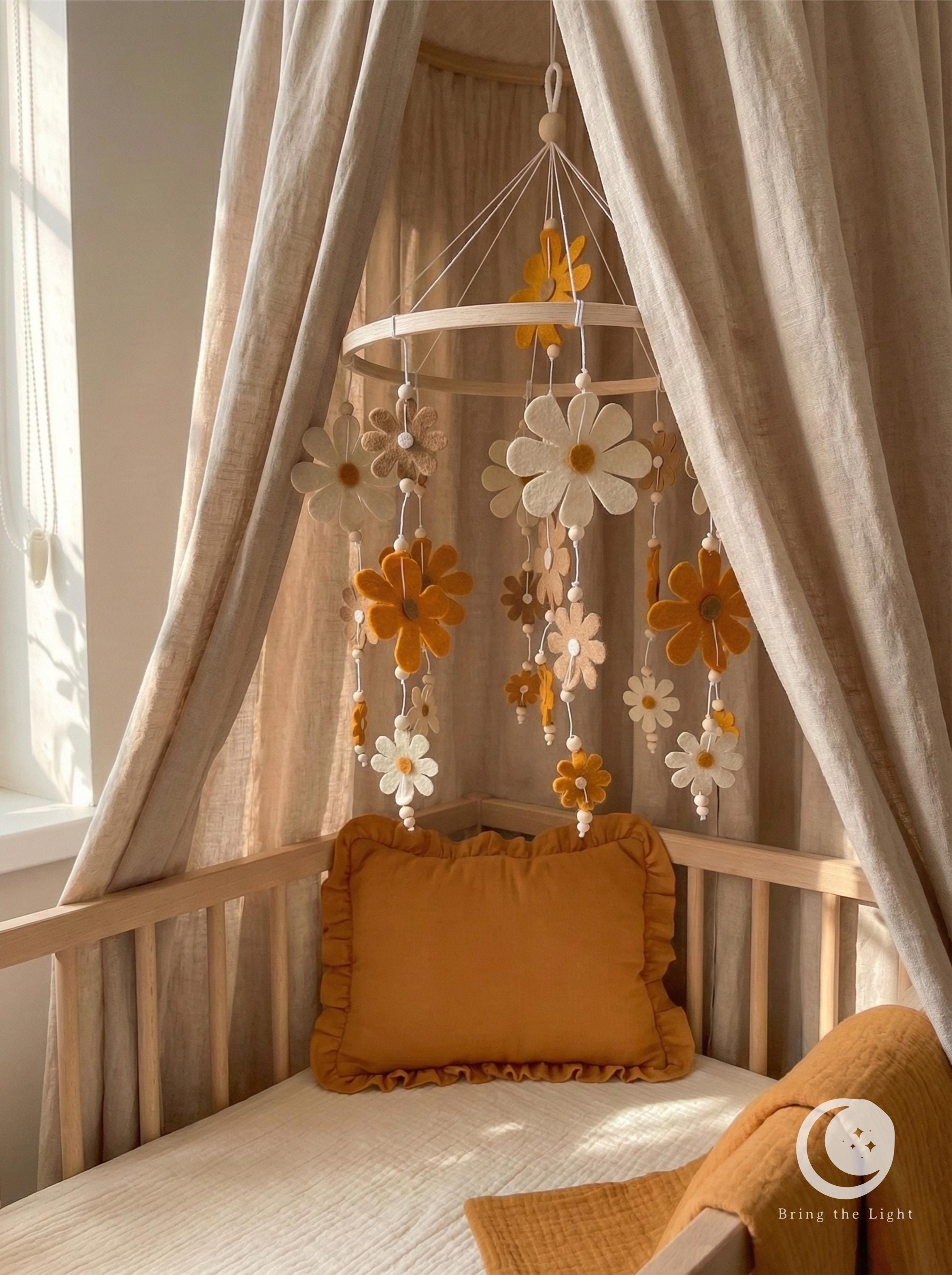 Felt flower baby mobile in neutral nursery tones