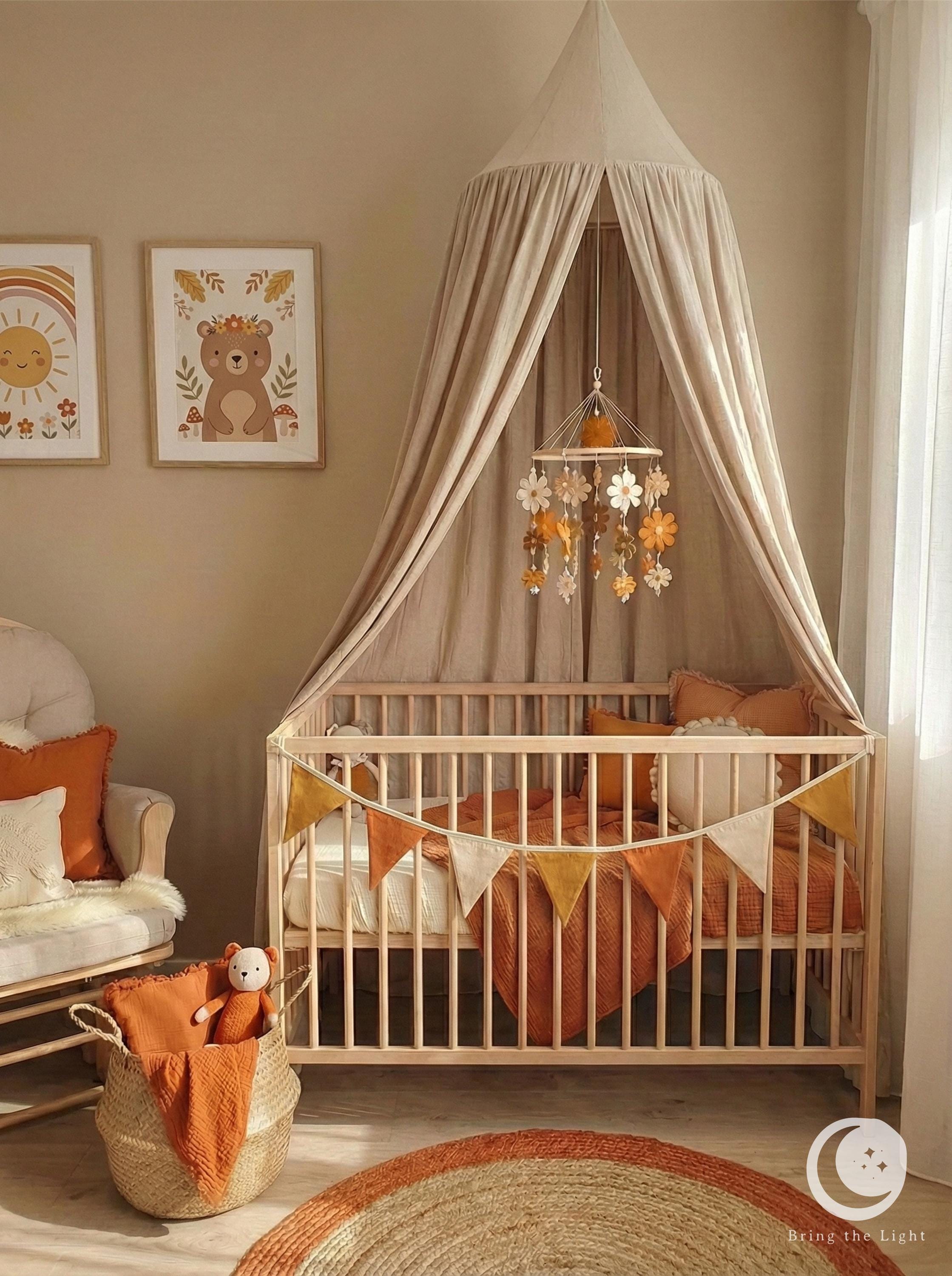 Felt flower baby mobile in neutral nursery tones