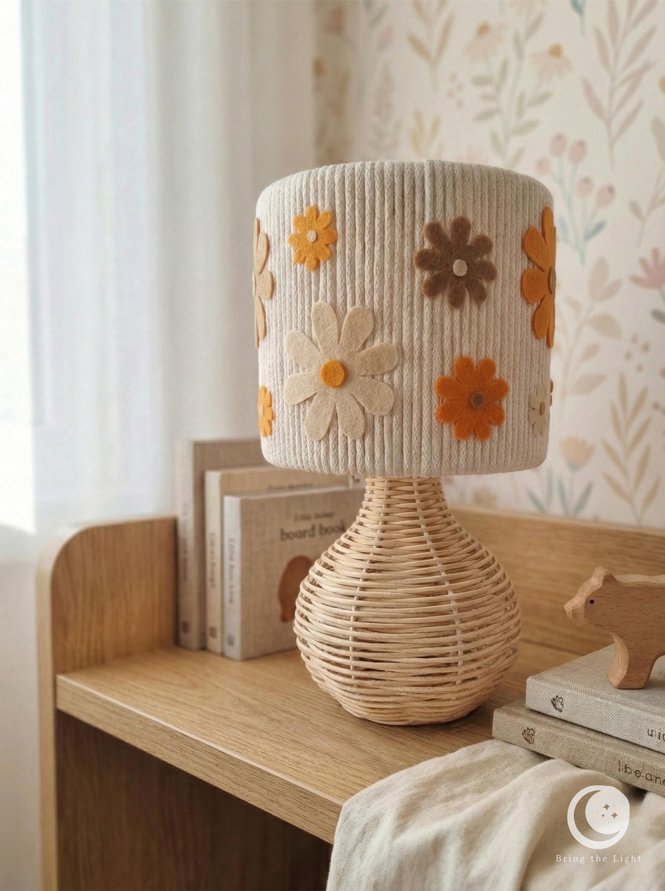 Felt flower nursery night lamp with hand-braided base