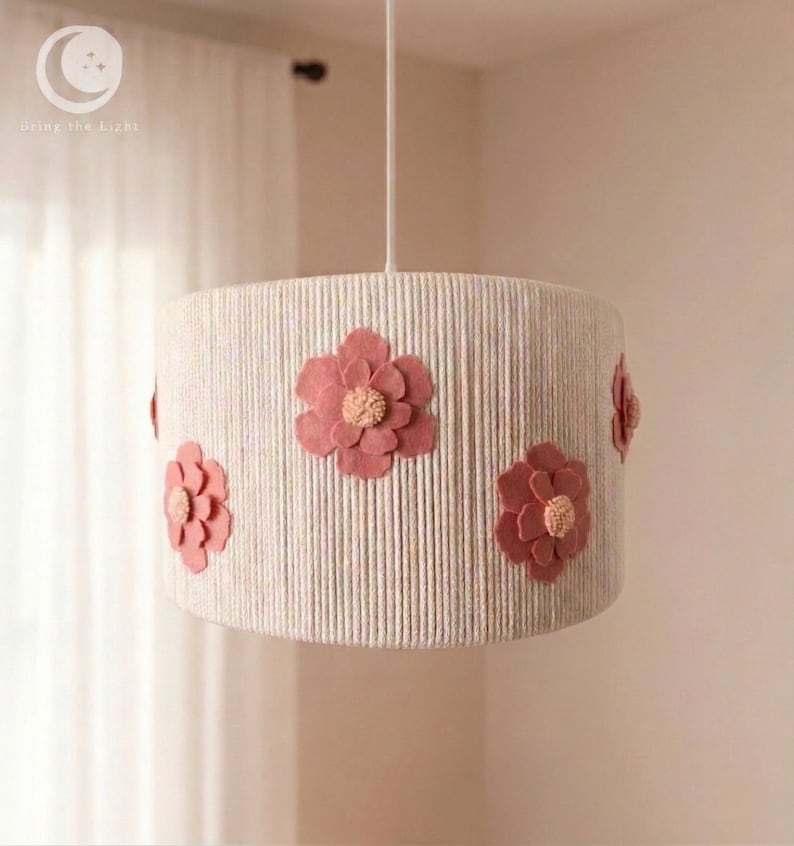 Handmade floral nursery lampshade with dusty-rose felt flowers on a beige cotton base