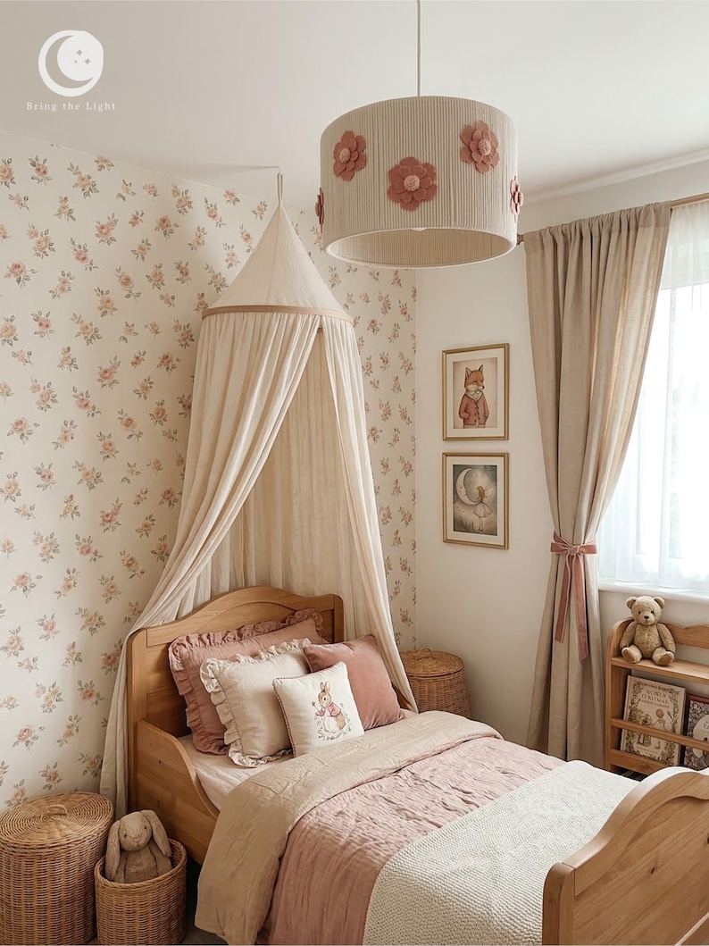 Handmade floral nursery lampshade with dusty-rose felt flowers on a beige cotton base