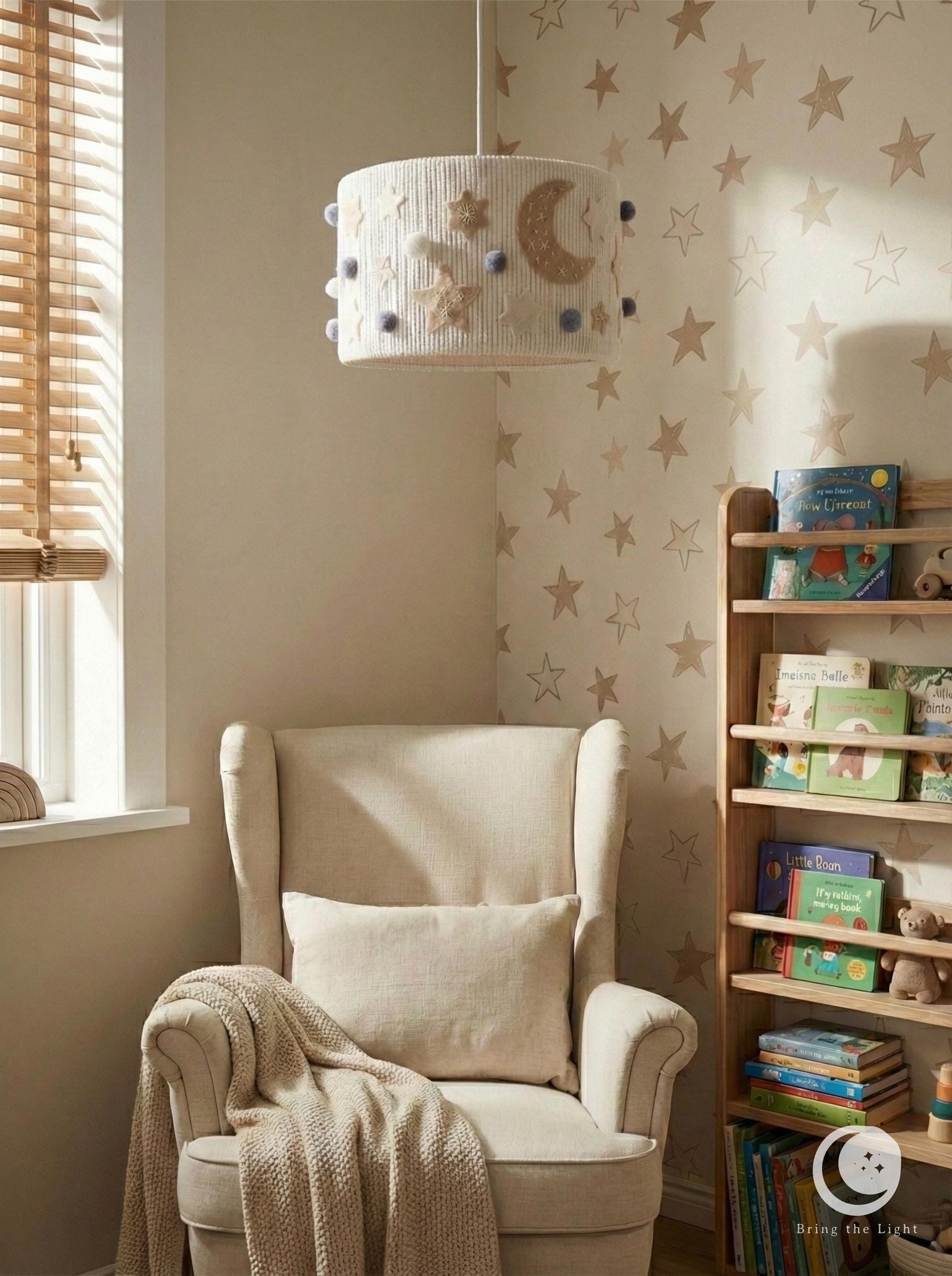 Handmade Night Sky nursery ceiling lamp with felt moons, stars, and pom-poms