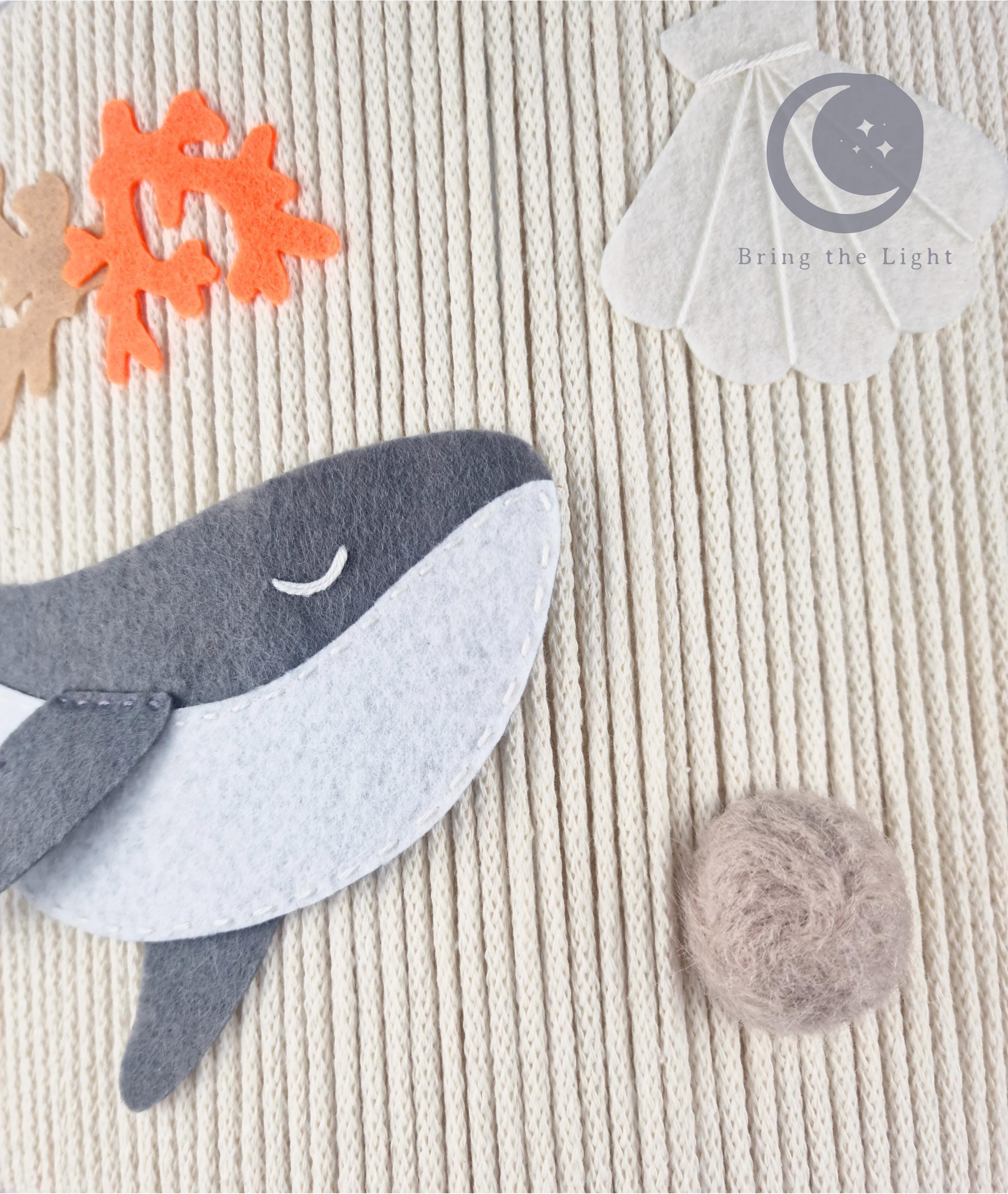 Handmade whale ocean nursery ceiling lamp in neutral cotton tones